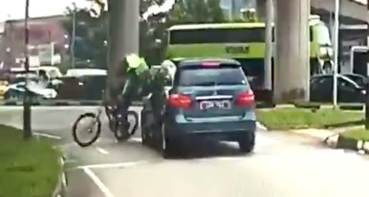 Mercedes hit Cyclist zebra crossing roads singapore